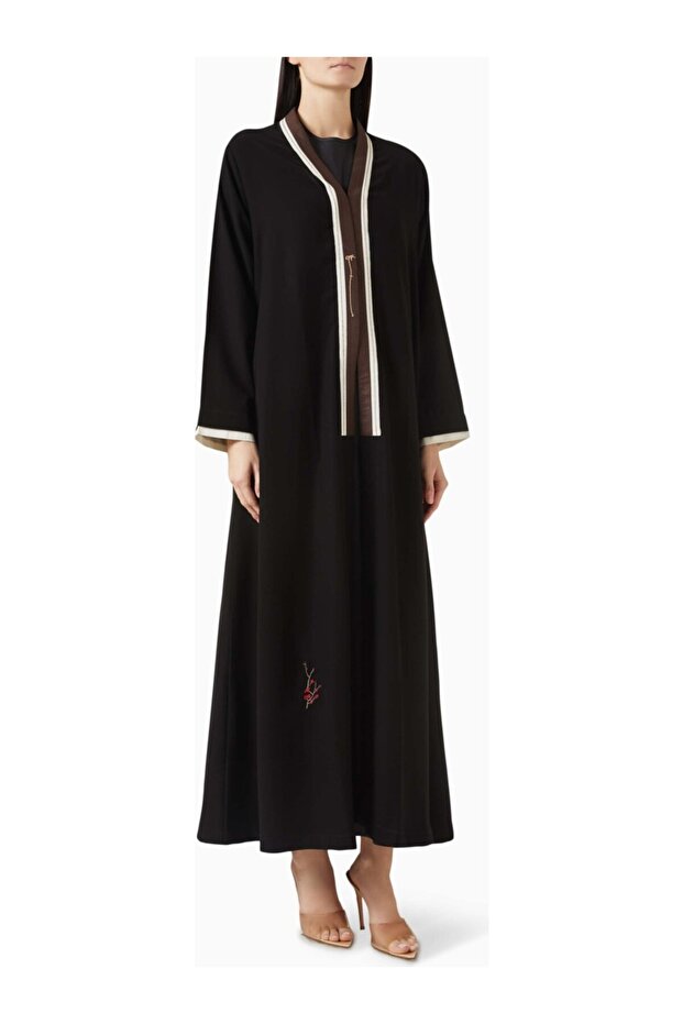 Modern and Stylish Long Sleeve Abaya with Intricate Details Offering an Elegant Look