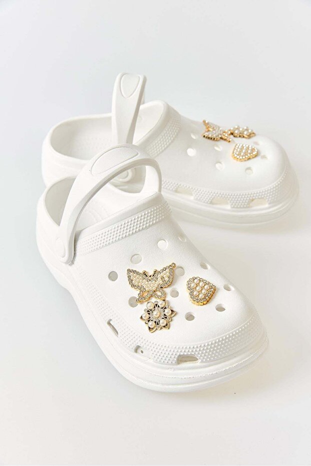 White, Lightweight, Soft-Soled, Comfortable-Shaped Sabo Slippers with Gold Accessory Details.