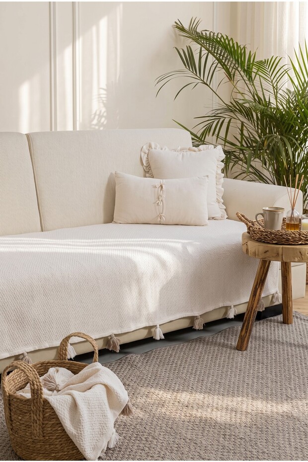 Liva pom-pom ecru sofa cover 115 x 200 cm - suitable for sofas, divans, sleeper beds, and armchairs - shawl style with tassels