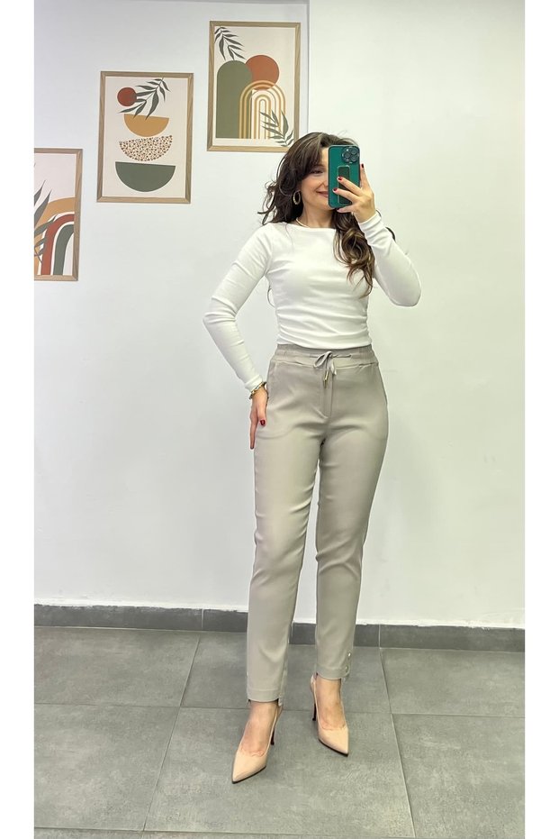 Lycra Trousers with Gold Button Detail on the Legs, Elastic Waist and Pockets