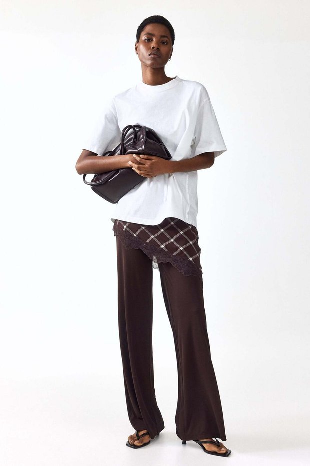Skirt-layered trousers