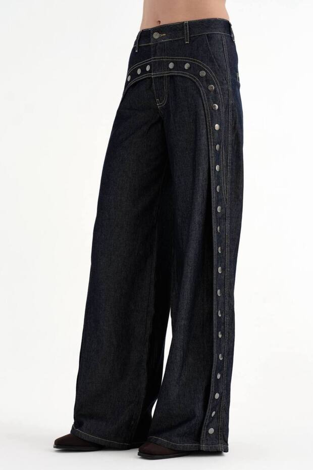 Women's palazzo jeans with full snap detailing at the front