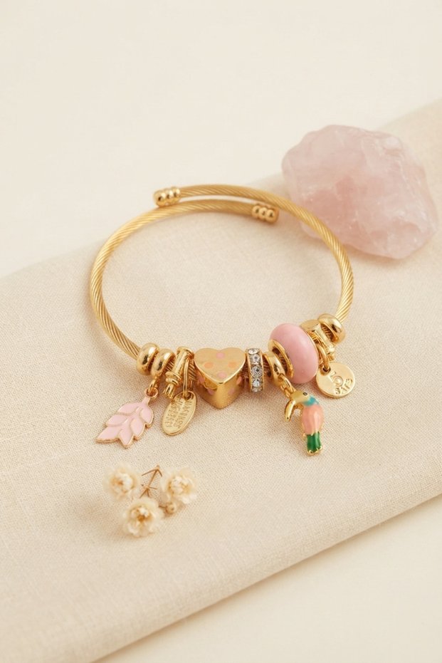 Gold Color Bracelet with Bird Figure and Pink Charm -