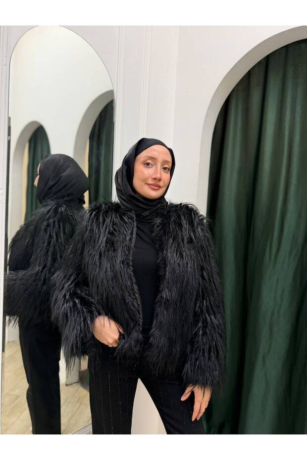 سترة مبطنة بالريش من القطيفة