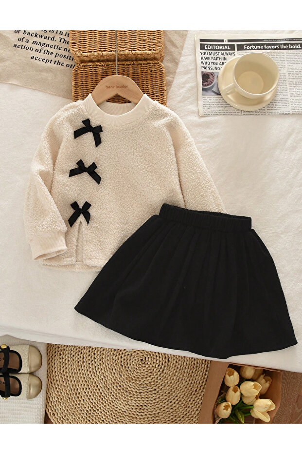 Compleu, Negru/crem