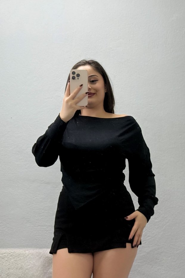 بلوزة نسائية بزوي بقصة غير متماثلة باللون الأسود