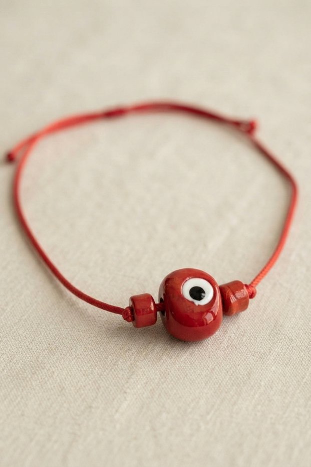 Handmade bohemian red evil eye necklace
