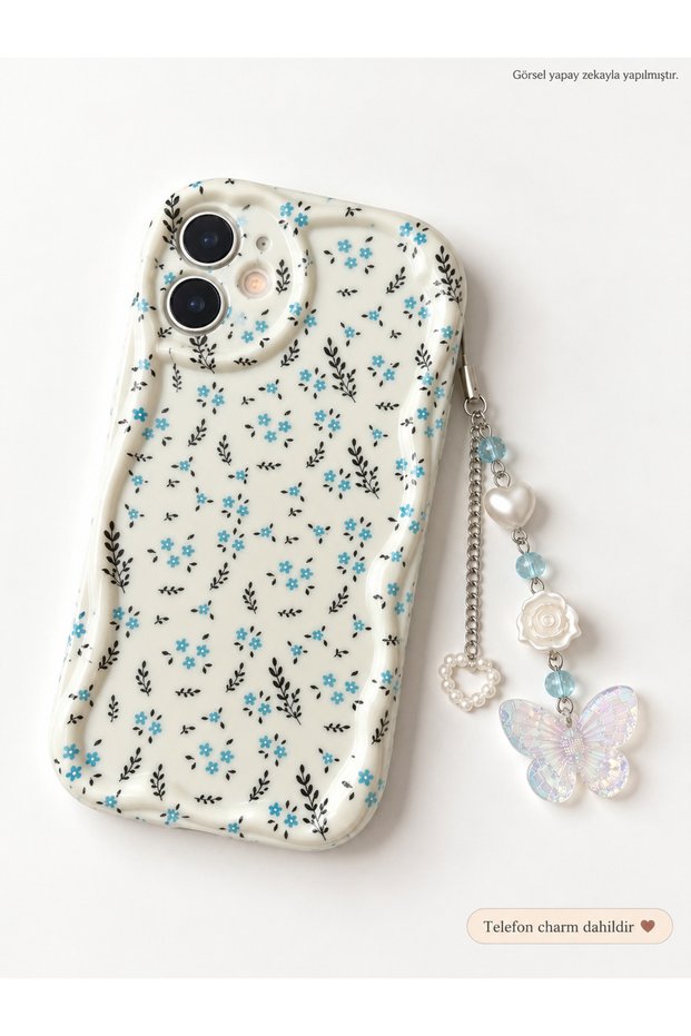 Iphone 16 plus phone with blue flower patterned ecru case