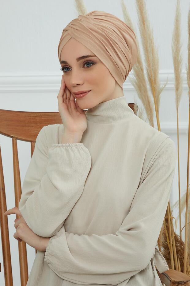 طاسة رأس للحجاب، B-9 بني حليبي