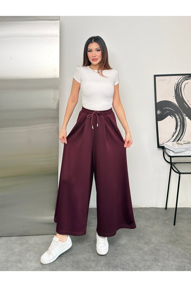 Wide Cut Flared Trousers with Elastic Waist and Double Skirt