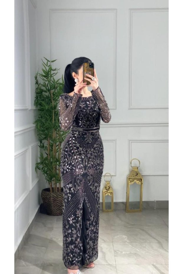 فستان سهرة شك بثنايا من الأمام
