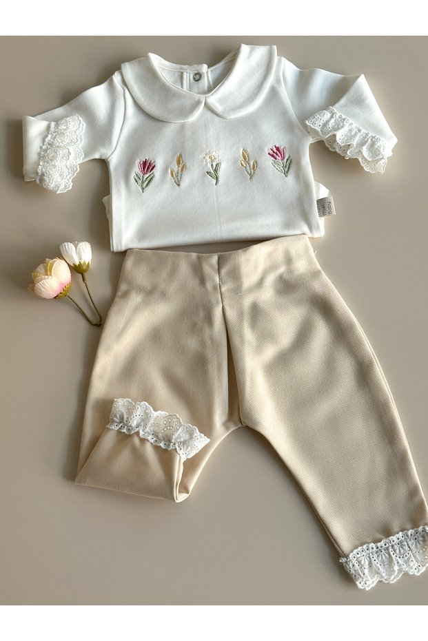 Layla Long-Sleeved Embroidered Bodysuit with Snap Fasteners and Fishtail Detail, in a Cream-Colored Set.
