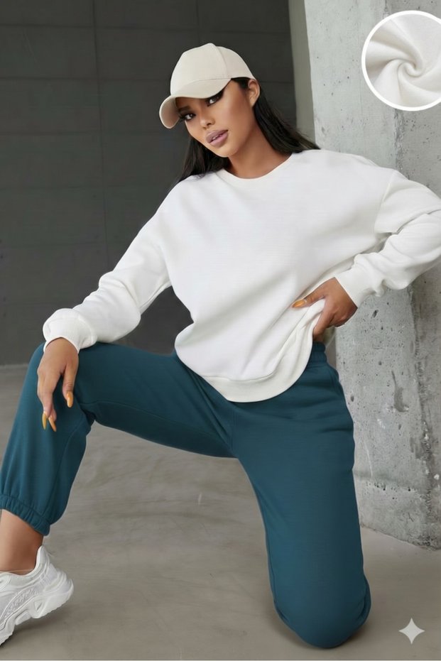 Women's White Crew Neck Sweatshirt and Petrol Blue Sweatpants Set.