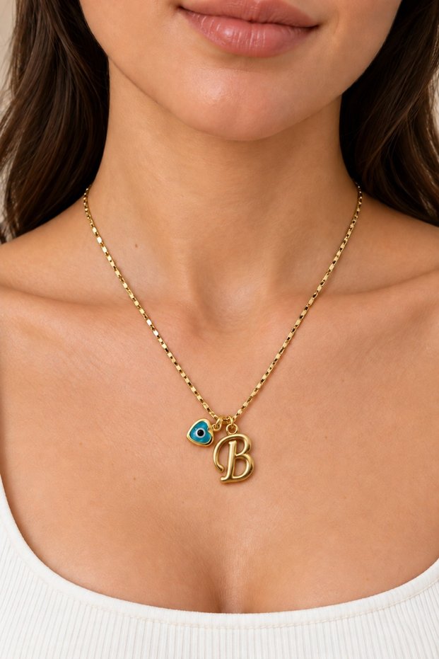 Vintage Necklace with Letter B and a Charm, Featuring a Delicate Chain.