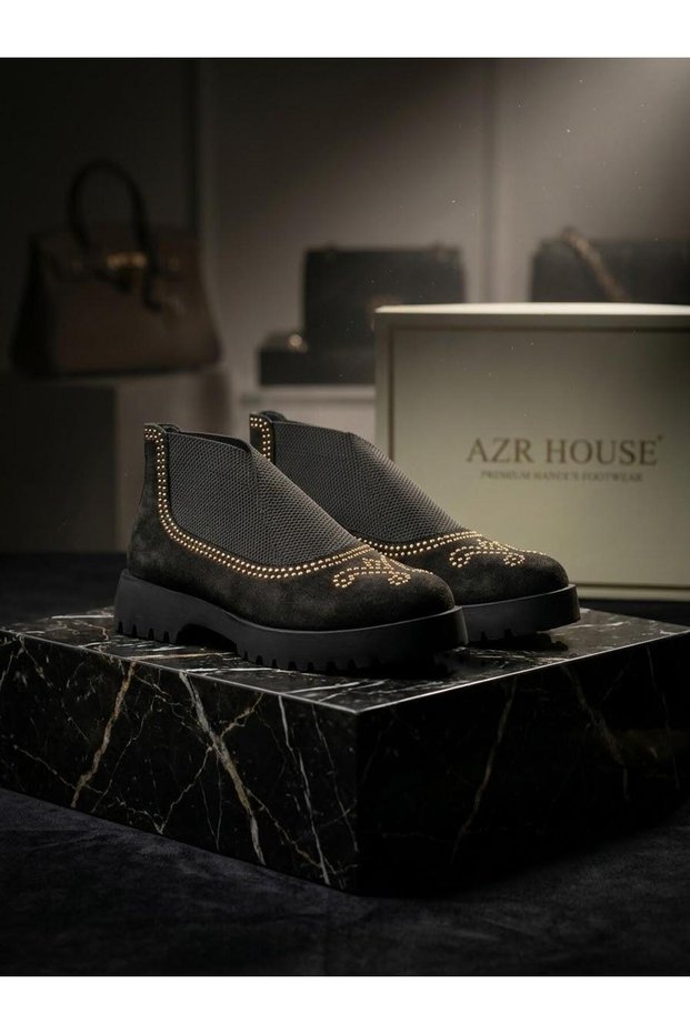 Short Boots with a Studded Upper and Elastic Cuffs.