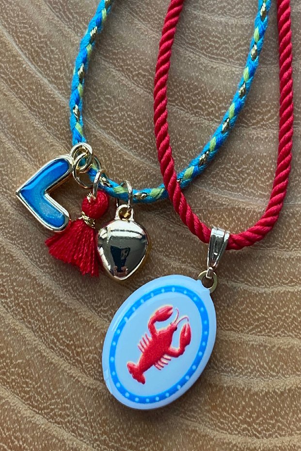 Set of 2 Enamel Crab Patterned and Object-Adorned Adjustable Rope Necklaces.