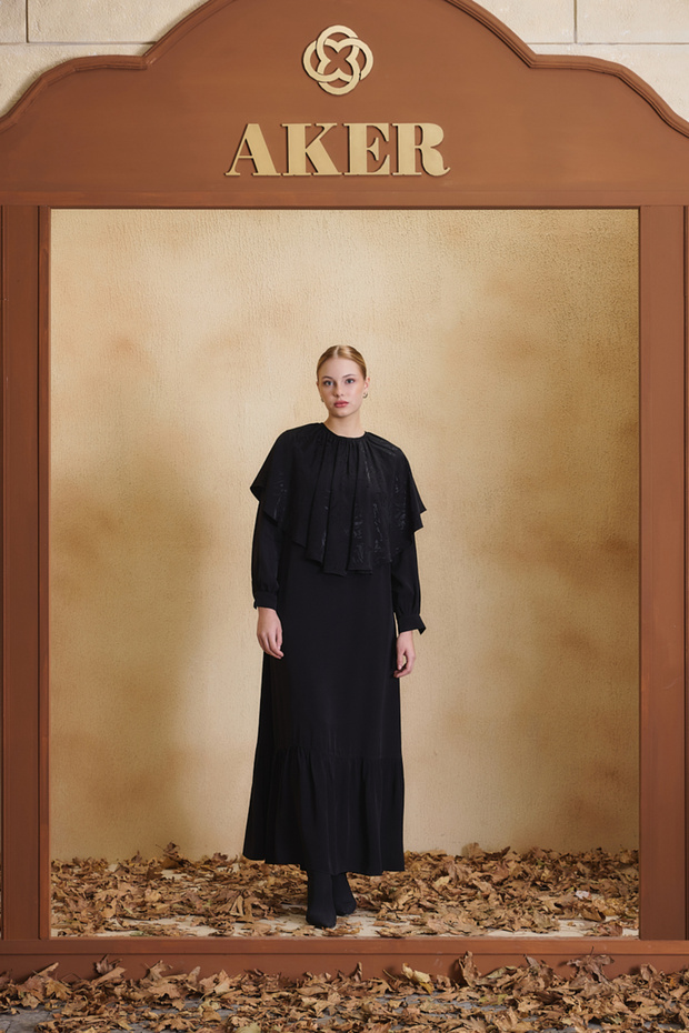Black Dress with a Detachable Cape.