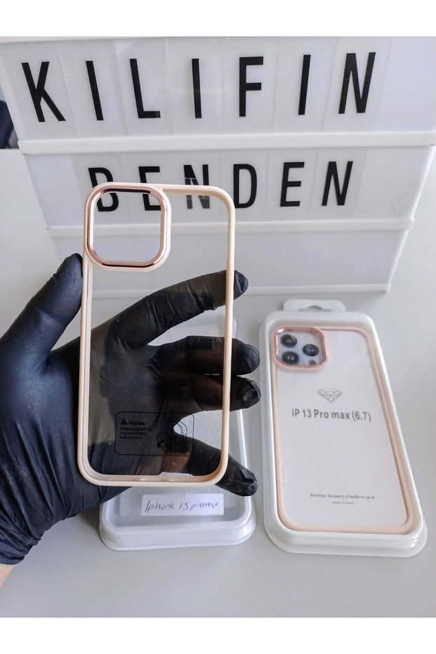 Iphone 13 pro max luxury pink-framed case model.