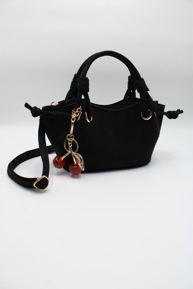 Women's Suede Black Crisscross Strap Crossbody Handbag and Shoulder Bag with Knot Detail and Cherry Charm Accessory Detail