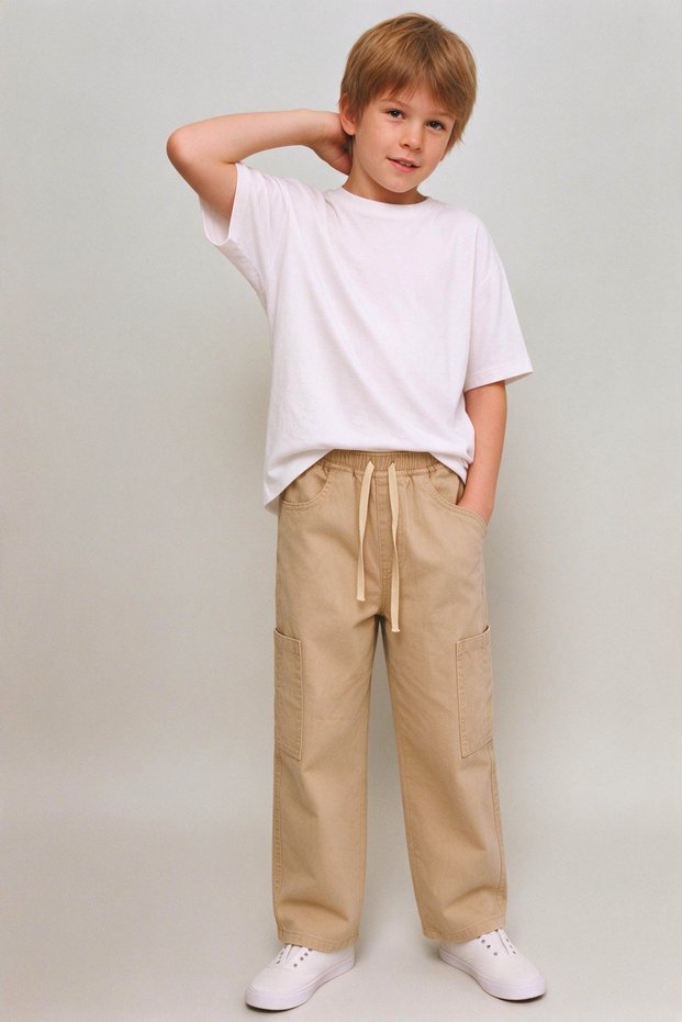 CHILDREN'S BEIGE PANTS WITH ELASTIC WAISTBAND, CARGO POCKETS, AND A RELAXED FIT