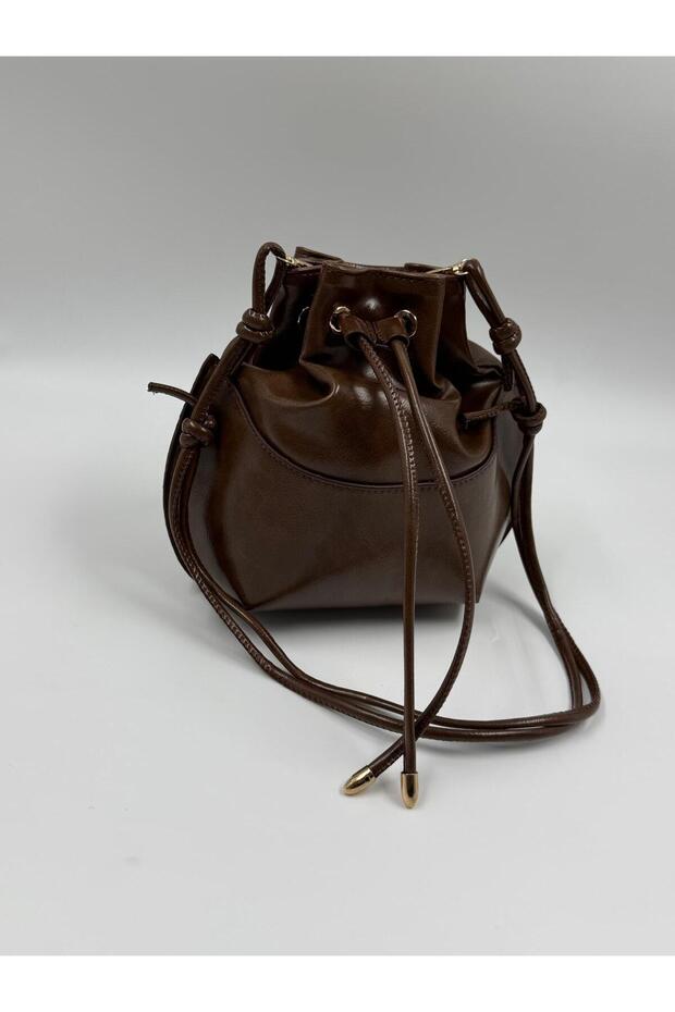 Lucia Model Adjustable Knot-Strap Bucket Bag