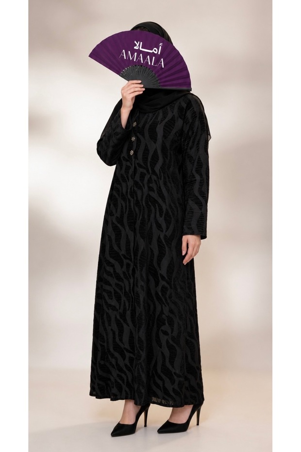 Black Abaya with a Tie-Dye Pattern.