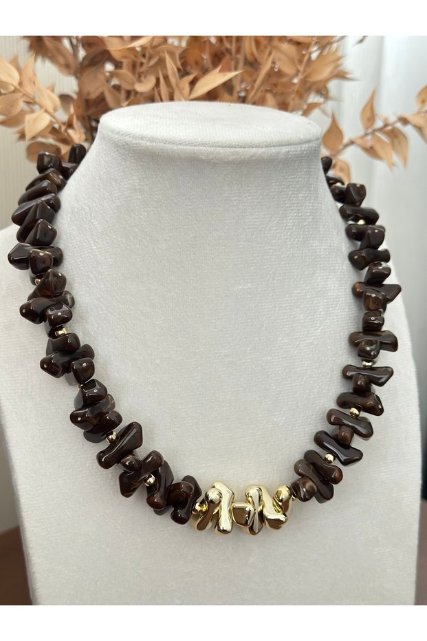 Gold detailed bone bead necklace, a trendy necklace.