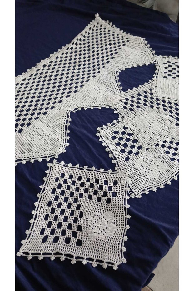 One 55 x 25 piece, four 16 x 16 squares of lace knitted from floss yarn
