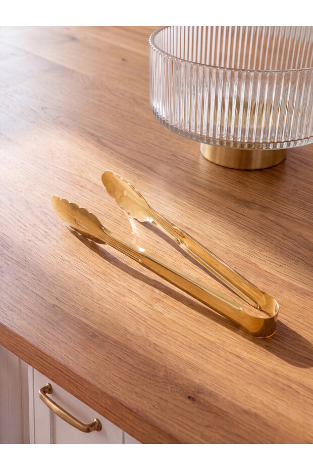 A Metal Serving Tongs for Style-Conscious Shoppers from UZG STORE
