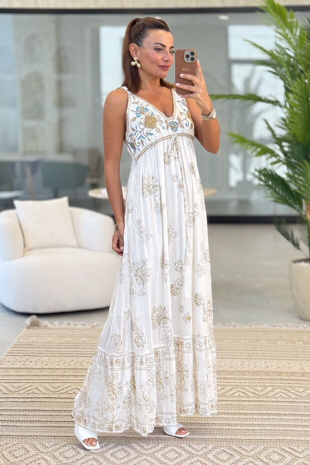 Imported Embroidered Dress with Sequin Details.