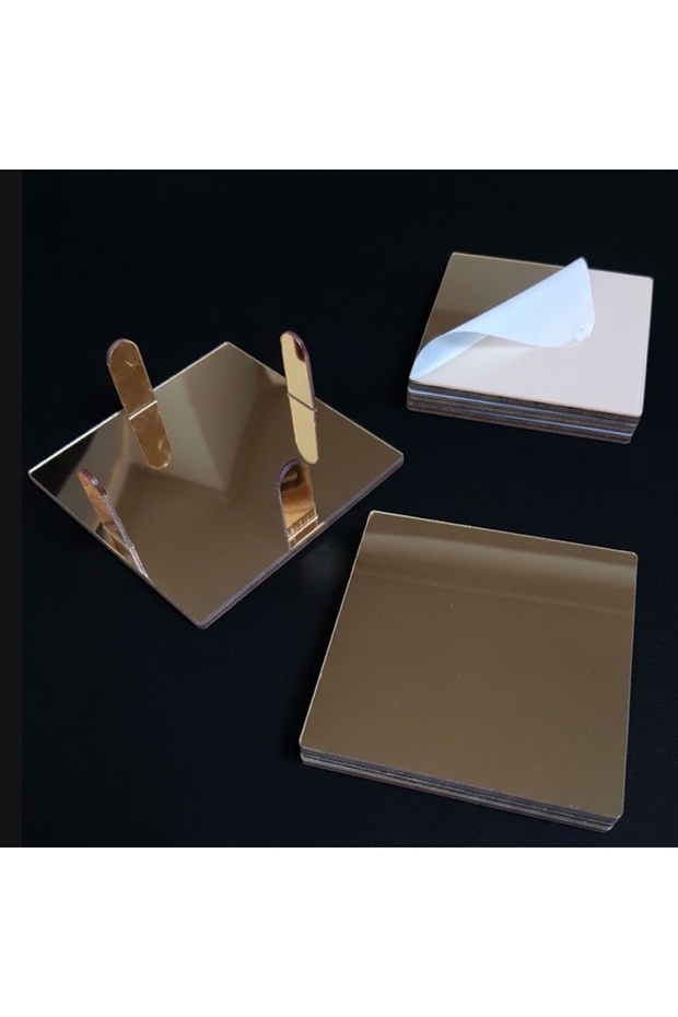 The coaster is gold-colored