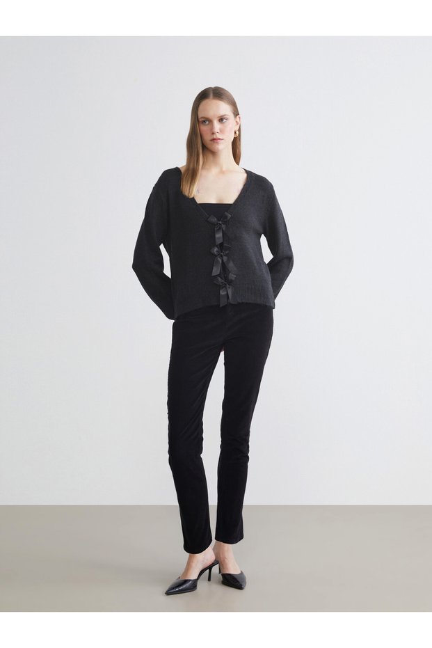LCWAIKIKI Classic Black Velvet straight and narrow leg women's pants, featuring the ALITA CITY Touch
