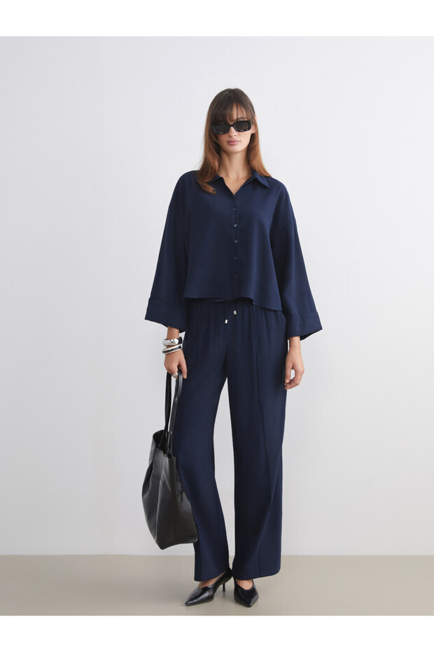 Trendy Picks from Kübra Butik: Women's Wide-Leg Pants with a Drawstring Waist