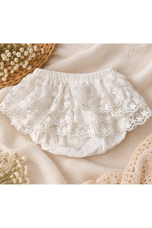Ruffled, lace-trimmed muslin slip