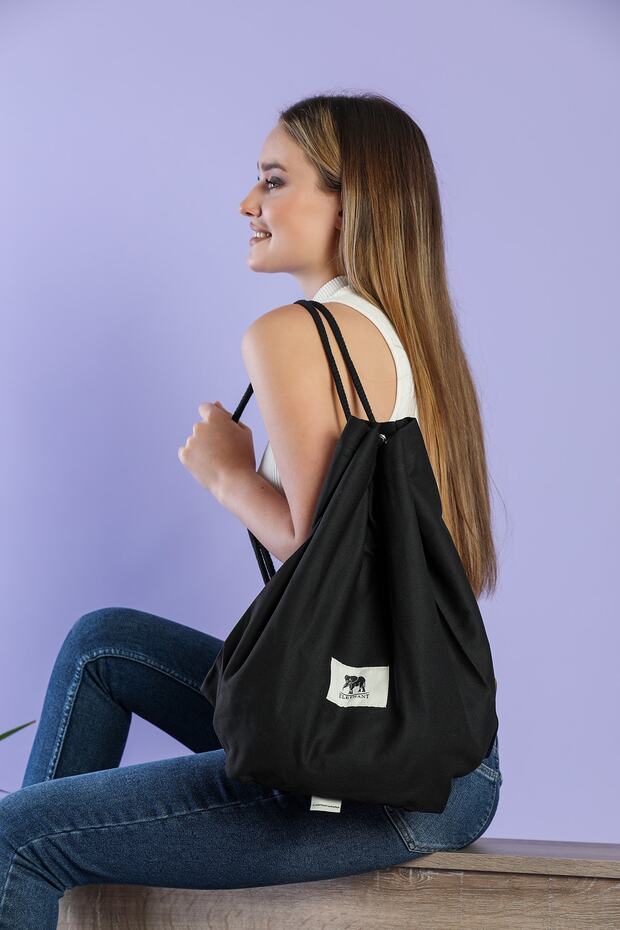 حقيبة ظهر برباط من القماش الأسود للجنسين - 1