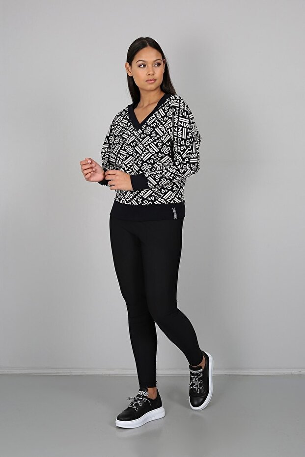 Black Patterned V-Neck Blouse with Ribbed Back Detail