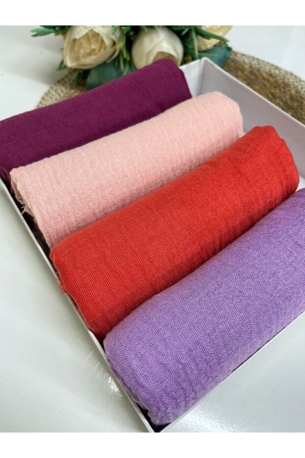 Four Wrapped Shawls