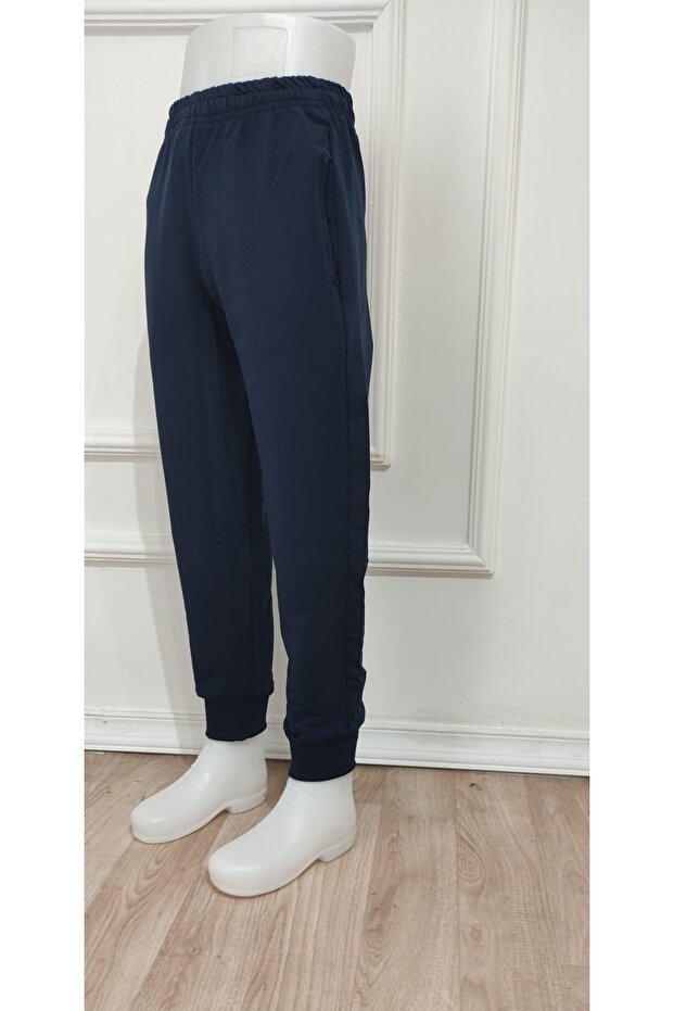 الجزء السفلي من بدلة رياضية مدرسية بلون سادة وأرجل مطاطية أساسية للأطفال - 3