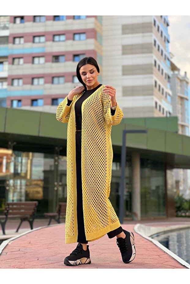 سترة نسائية طويلة محبوكة بفتحة