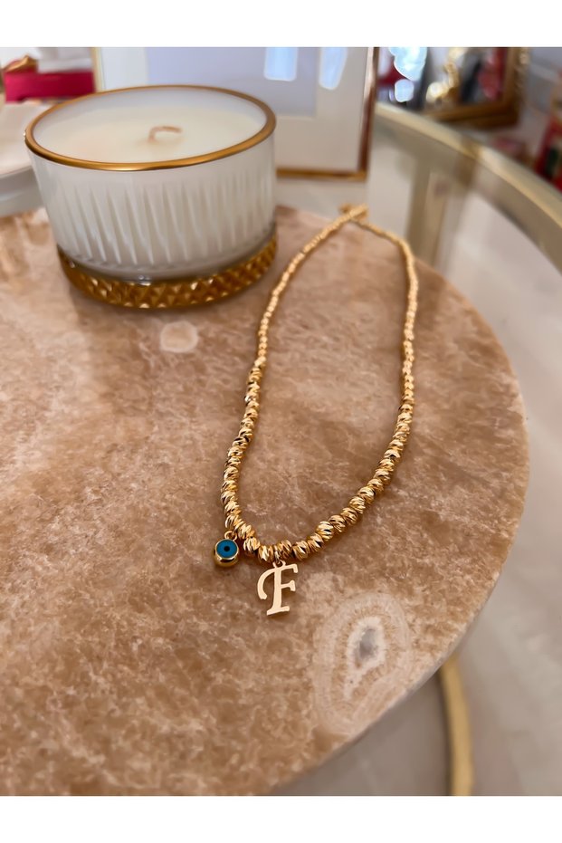 Dorika Necklace with Letter F and Evil Eye Detail