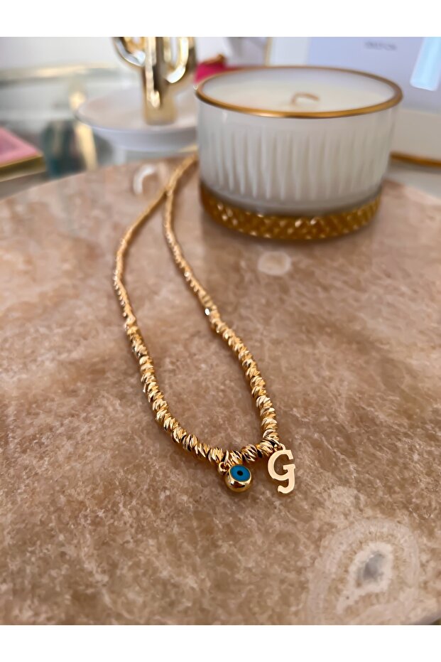Dorika Necklace with Letter g and Evil Eye Detail