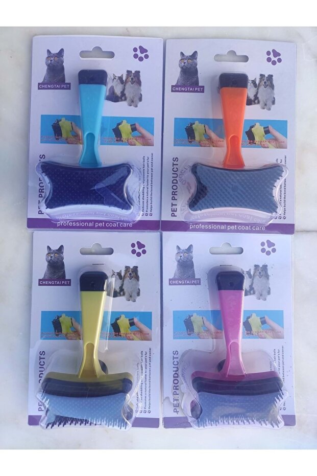 مشط أوتوماتيكي للقطط والكلاب صغير - 1