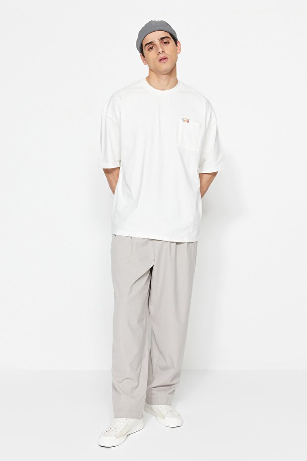 Ekru Oversize/Geniş Kesim Kısa Kol Minimal Nakış İşlemeli Cepli T-shirt TMNSS23TS00100 - 5