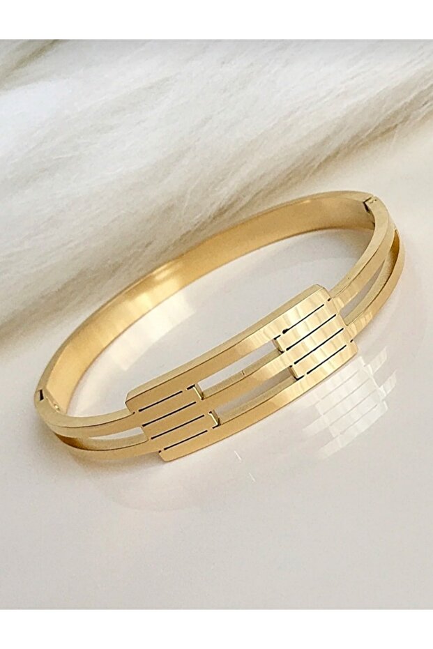 Gold Steel Rib Clamp Bracelet