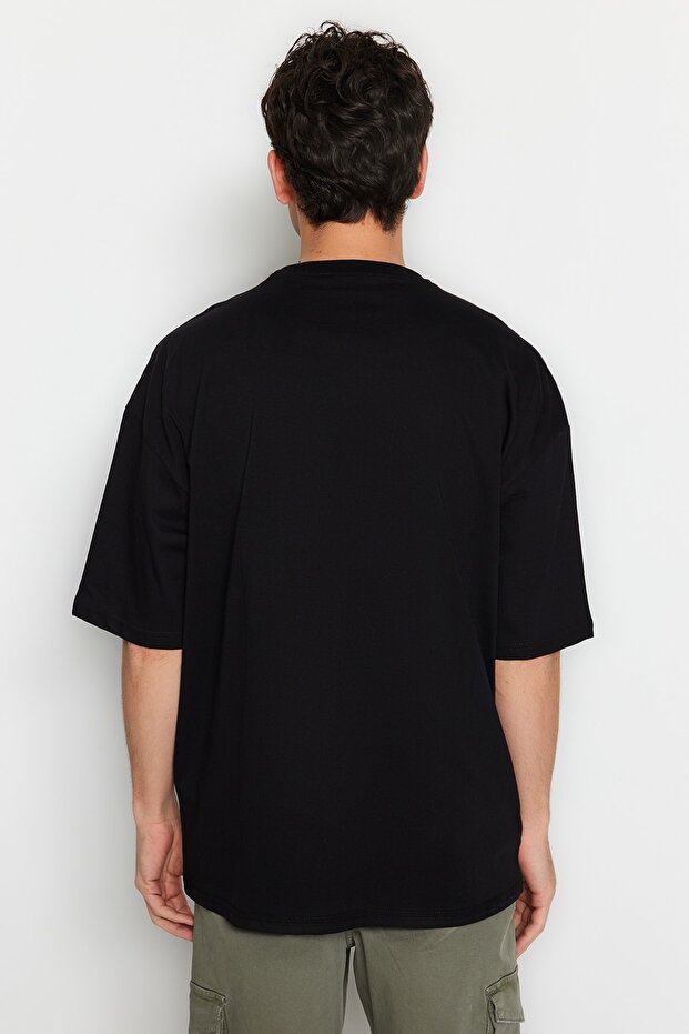 Siyah Oversize/Geniş Kesim Bisiklet Yaka Kısa Kol Dinozor İşlemeli T-Shirt TMNSS23TS00243 - 2