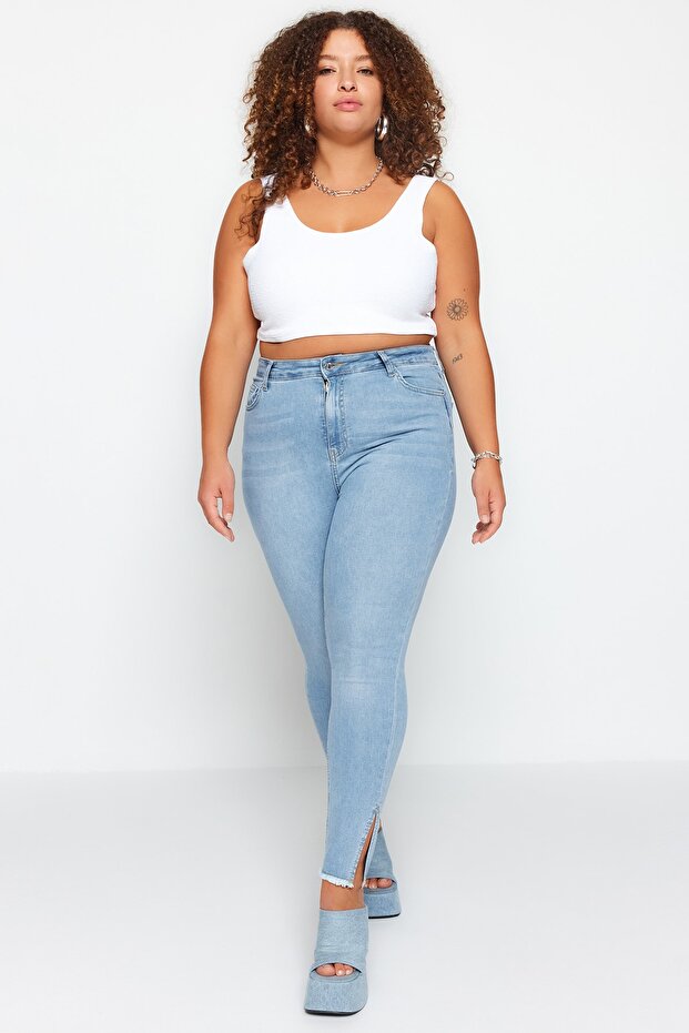 Açık Mavi Paçası Yırtmaç ve Püskül Detaylı Esnek Skinny Denim Jeans TBBSS23CJ00020 - 1