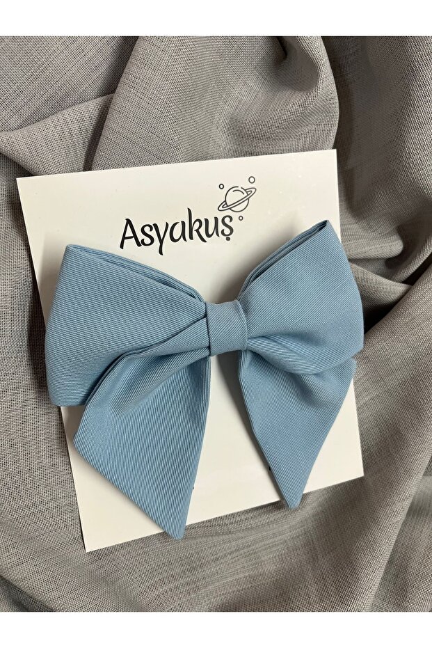 مشبك أوتوماتيكي بفيونكة زرقاء فاتحة - 2