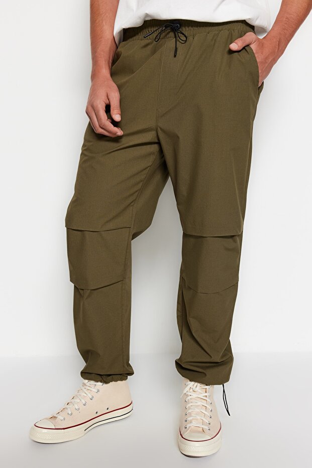 Haki Lastikli Beli Bağlamalı Jogger Fit Baggy Paraşüt Pantolon TMNSS23PL00045 - 1