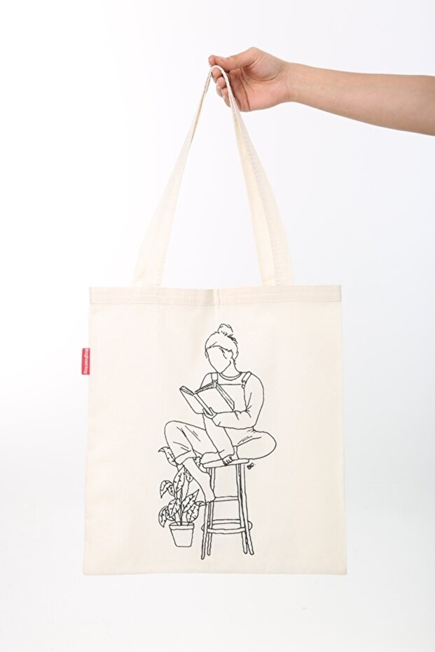 Woman Sitting on Stool with Cloth Bag Printed