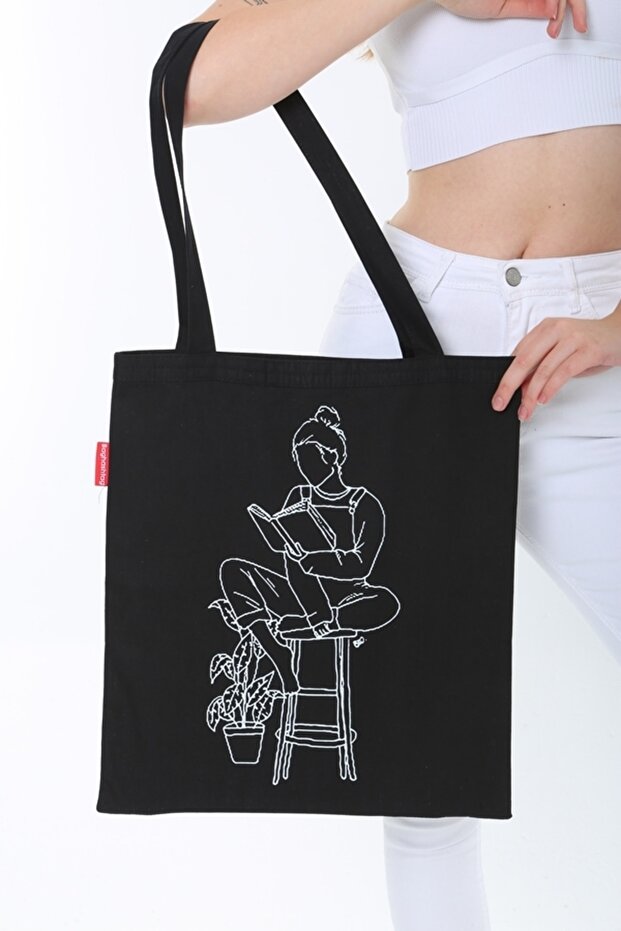 Woman Sitting on Stool with Cloth Bag Printed